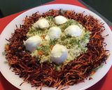 Une image de l'étape 8 de Salade façon nid au riz petits légumes carottes violettes et mozzarella.