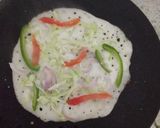 A picture of step 4 of Veg uttapam.