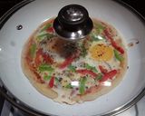 A picture of step 4 of Egg Pan Pizza#worldwideeggs.
