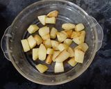 A picture of step 2 of Pepper Ghanto (Grated Green Papaya with Potato).