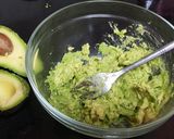 A picture of step 3 of Cheese nachos with salsa and guacamole.
