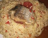 A picture of step 5 of Jollof spaghetti and cooked fish.