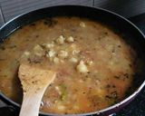 A picture of step 13 of Stuff daal kachodi with aalu tari.