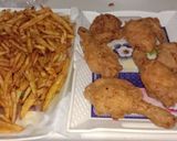 A picture of step 4 of Chicken fry with fries.