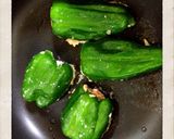 A picture of step 10 of Meat and Firm Tofu Stuffed Peppers.