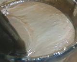 A picture of step 4 of Hershey 's cocoa almond shake.
