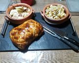 Foto del paso 5 de la receta: Carre de cerdo en hojaldre con papas cubo y pepinos