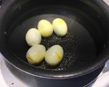 A picture of step 3 of Kolkata style egg biryani.