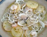 Foto del paso 14 de la receta: Patatas con gambas, almejas y gulas