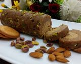 A picture of step 12 of Biscuits Meethi (Swiss roll style).