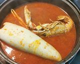 Foto del paso 9 de la receta: Calamar relleno de sus tentáculos, aletas y Cigala