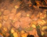 A picture of step 6 of “Snowed in” chicken and aubergine curry ❄️🌶.