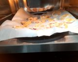 A picture of step 6 of Crispy Baked Onion Rings.