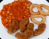 A picture of step 3 of Southern fried Chicken Dippers, Onion rings + BBQ Beans 😋.