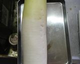 A picture of step 1 of Prep Daikon Radish for Buri Daikon and Simmered Dishes.