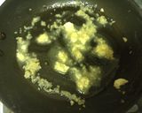 A picture of step 3 of Buttered Garlic Spinach.