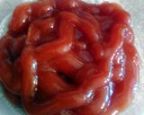 A picture of step 1 of Bloody Severed Fingers ( hot dogs with ketchup ) halloween.