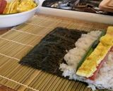 A picture of step 4 of Spam and Egg Sushi Roll.