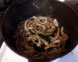 A picture of step 4 of Smothered Pork Steak.