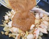 A picture of step 7 of My Yellow Coconut Curried Chicken & king Prawns. 😀.
