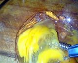 A picture of step 2 of Sig's Scrambled Egg O'(range) la la.