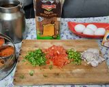 A picture of step 1 of Schezwan chutney brown Bread 🍞 tomato 🍅 onion omellete.