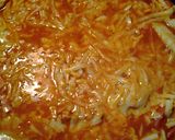 A picture of step 3 of Cheesy Chicken and Carrots in Tomatoes.