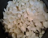 A picture of step 3 of Cheesy sausageball onion casserole.