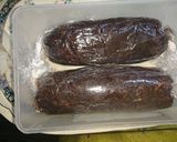 A picture of step 8 of Chocolate and biscuit salami.