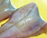 A picture of step 1 of Mom's Simmered Flounder.