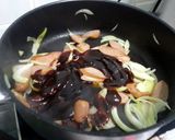 A picture of step 2 of Sausage And Onion In BBQ Sauce.