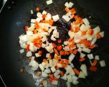 A picture of step 2 of Beefy penne carbonara pasta.