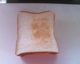 A picture of step 4 of Kissaten Style Ham and Cucumber Toasted Sandwich.