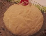 A picture of step 6 of Pineapple filled toasted coconut yellow rum cake..