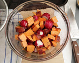 A picture of step 1 of Sautéed Chicken and Apples with Roasted Sweet Potatoes and Radishes.