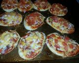 A picture of step 6 of Jens famous Lil pizzas.