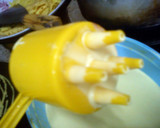 A picture of step 3 of Roti Jala (Net Like Bread).