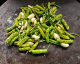 A picture of step 3 of Green Chilies Thecha.