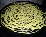 A picture of step 4 of Roti Jala (Net Like Bread).