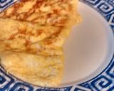 A picture of step 5 of 3 egg and cheese omelette.