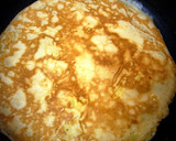 A picture of step 5 of Easy Crepes with Pancake Mix in a Frying Pan.