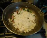 A picture of step 3 of Coconut rice.
