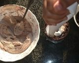 A picture of step 4 of Oreo mouse dessert.