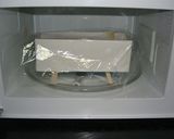 A picture of step 7 of Sesame and Kinako Marbled Japanese Flavored Steamed Bread Made in a Microwave.