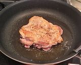 A picture of step 12 of Authentic Garlic Chicken in a Frying Pan.
