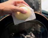 A picture of step 5 of Melt-in-your-mouth Hawaiian Malasada Donuts.