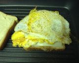 A picture of step 9 of Grilled Sausage Fried Egg And Cheese.