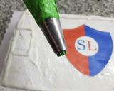Foto del paso 9 de la receta: Torta de cumple "Cancha de fútbol"