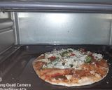 A picture of step 21 of Pasta Pizza.