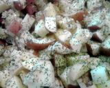 A picture of step 10 of Extreme Butter Garlic Baked Pork Chops with Potatoes.